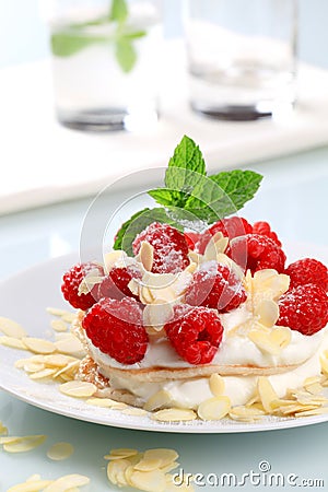 Cream cheese pancakes with raspberries Stock Photo