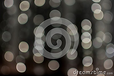 Cream-colored bokeh balls, blurred garland, texture, background, photography is out of focus, copy space, abstract Stock Photo