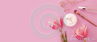 Cream cosmetic flower treatment advertising tulip perfection on colored background Stock Photo