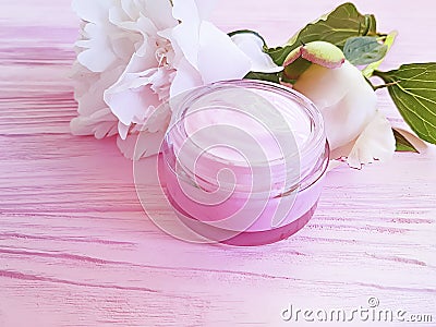 Cream cosmetic petal organic bloom peony cleanser moisturizing spring aromatherapy flower wooden background Stock Photo