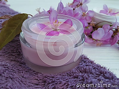 Cream cosmetic relaxation beauty care spa treatment organic protection wellness product handmade on blue wooden Stock Photo