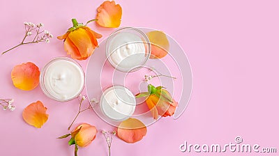 Cream cosmetic rose relax accessories ointment ingredients moisturizing therapy flower on colored backgrounhygiene d Stock Photo