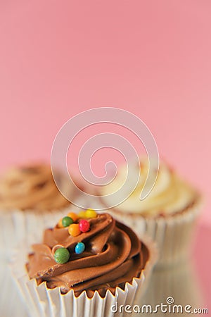 Cream cupcakes. White and black chocolate cakes.Chocolate dessert. sweet table. Sweets and desserts. Baked goods and Stock Photo