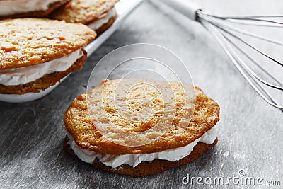 Cream filled carrot cake cookies sandwich Stock Photo