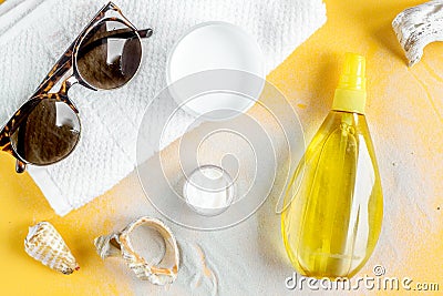 Cream and lotion cosmetic for sun protection on orange background top view Stock Photo