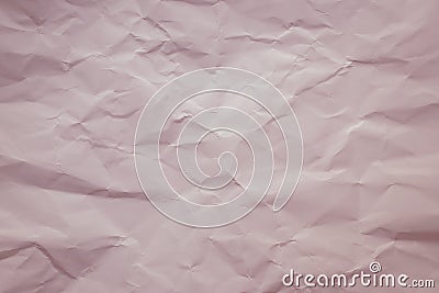 Cream paper background. Pastel, soft pink color. Vintage texture of creased sheet. Painted crumpled page, pattern. Copy space. Lig Stock Photo