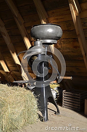 Cream separator in a barn hayloft Stock Photo