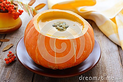 Cream soup from pumpkin in pumkin Stock Photo