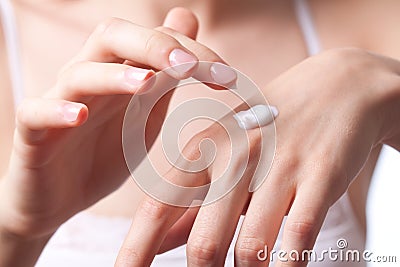 Cream on the women hand Stock Photo