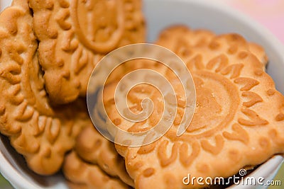 Creamy cookies in a plate. Sweets. Children`s favorite food. Stock Photo