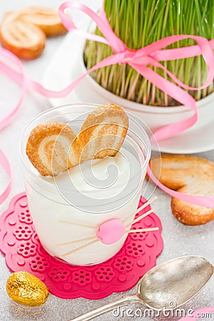 Creamy dessert with cookies in glass in the form of Easter bunny Stock Photo