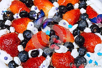 Creamy dessert with fresh strawberries and blueberries Stock Photo