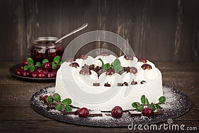 Creamy cake with whipped cream, sour cherry and dark chocolate - Schwarzwald cake Stock Photo