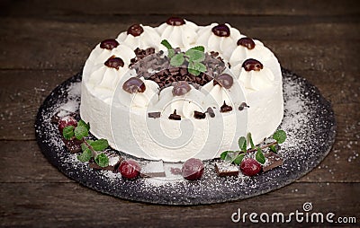 Creamy fruit cake, delicious cake with whipped cream, sour cherry and dark chocolate - Schwarzwald cake Stock Photo