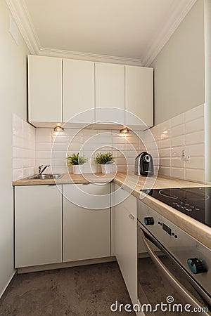 Creamy and modern cooking space Stock Photo