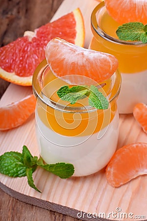 Creamy panna cotta and orange citrus jelly Stock Photo