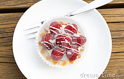 Rasberry cake on white plate. Stock Photo