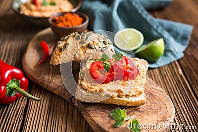 Creamy sheep cheese spread with onion, butter and paprika powder Stock Photo