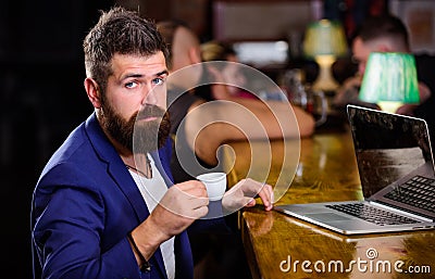 Create content web blog. Manager create post enjoy coffee. Hipster freelancer work online drinking coffee. Man bearded Stock Photo