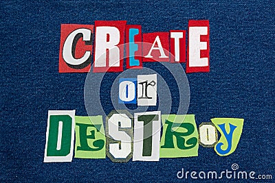 CREATE OR DESTROY text word collage colorful fabric on denim, encourage or discourage Stock Photo
