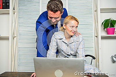 Create greater safety and trust. Sexual harassment at work. Man and woman colleagues flirt in office. Recognize pursuer Stock Photo