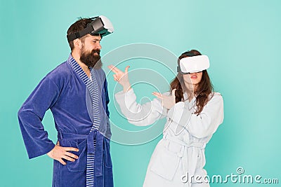 Create your reality. world of immagination. family couple wear vr glasses. girl and man hipster relax in bathrobe Stock Photo