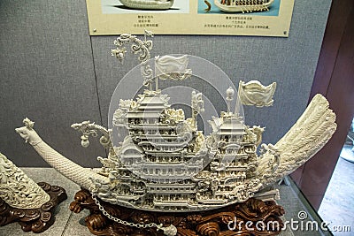 Created by carving ivory carving folk art, the content is a phoenix bird as the carrier of the ship. Editorial Stock Photo
