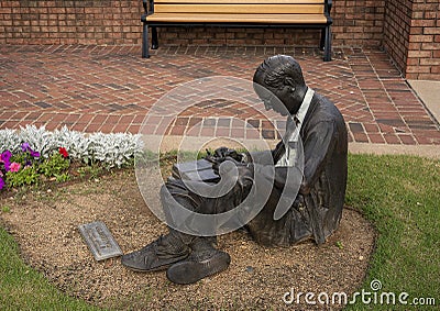 `Creating` by artist Seward Johnson Jr. in Lincoln Square in the City of Arlington, Texas. Editorial Stock Photo