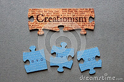 Creationism Matched and Evolution Mismatched Jigsaw Stock Photo