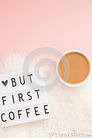 Creative autumn flat lay overhead top view coffee cup vintage lightbox But coffee first text on millennial pink background copy Stock Photo