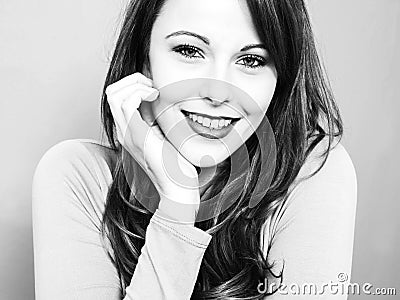 Creative Black and White Portrait of an Attractive Young Caucasina Woman Happy and Smiling Looking into the Camera Stock Photo