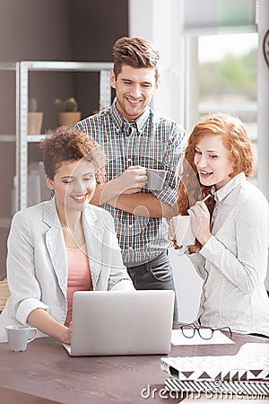 Creative business workers using laptop Stock Photo