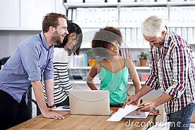 Creative collaboators. a team of design professionals working together in an office. Stock Photo