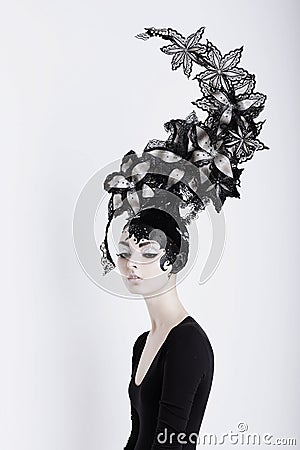 Creative Concept. Futuristic Woman in Art Fabulous Headdress Stock Photo