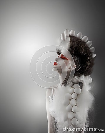 Creative Concept. Styled Futuristic Woman with Fantastic Headwear Stock Photo