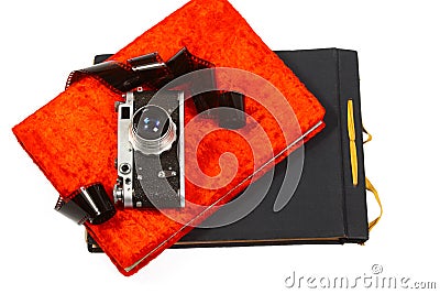 Creative concept of a vintage camera and colorful photo albums isolated on white background Stock Photo