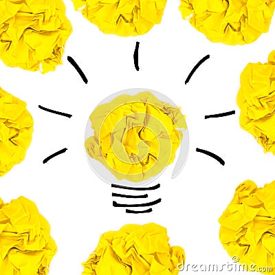 Creative concept. Yellow light bulb made of yellow crumpled, pap Stock Photo