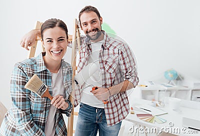 Creative couple renovating their house Stock Photo