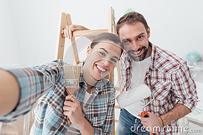 Creative couple renovating their house Stock Photo