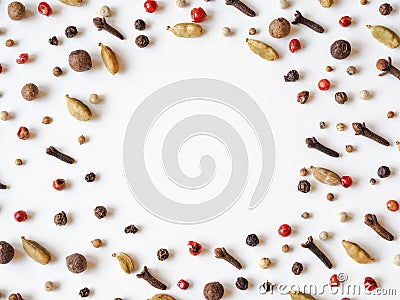 Creative decorative food composition frame of various spices on white background Stock Photo