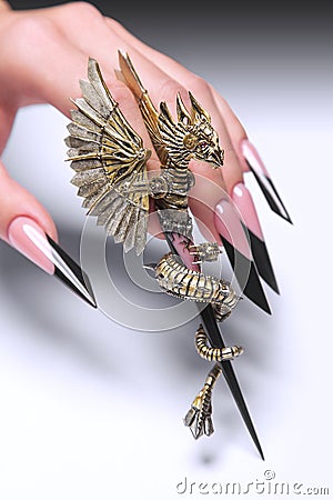 Creative design of nails on female hands. Art manicure. Stock Photo