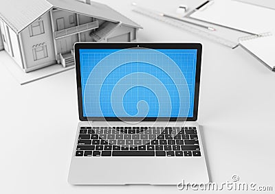 Creative designer and architect desktop with laptop, building model and stationery items. Mock up. Stock Photo