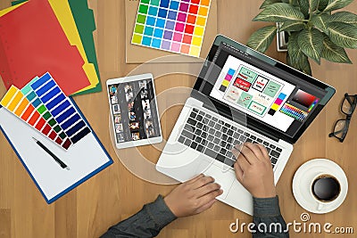 Creative Designer Graphic at work. Color swatch samples, Illustrator Graphic designer working digital tablet and computer Stock Photo