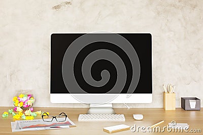 Creative desktop with computer monitor Stock Photo