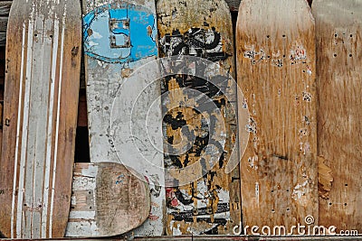 In a creative display of repurposing, old ski and snowboard decks have been transformed into unique wall decorations Stock Photo