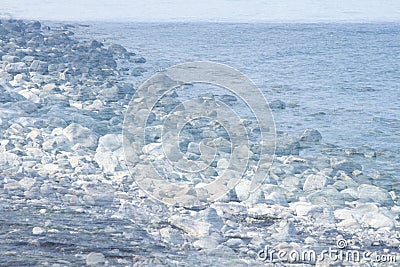 Creative dreamlike image of rocks by the sea Stock Photo