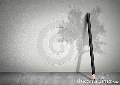 Creative ecology concept, pencil with shadow of tree Stock Photo