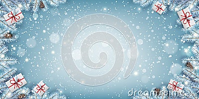 Creative frame made of Christmas snowy fir branches, gift boxes, snowflakes, light, stars on blue background. Merry Christmas Stock Photo