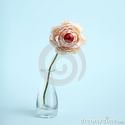 Creative Halloween layout with eyeballs flower in vase Stock Photo