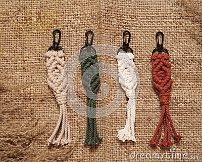 Creative hobby layout with accessories, top view. Handcrafted macrame. Stock Photo